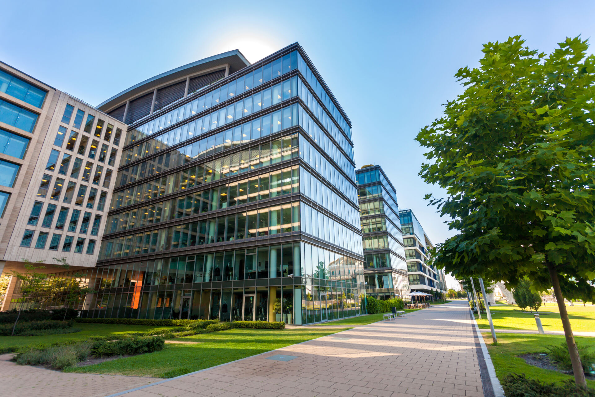 Exterior of a multi-story commercial office building managed as part of a multi-location security platform