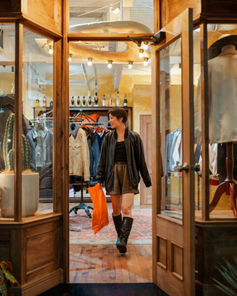 People walking in a clothing store