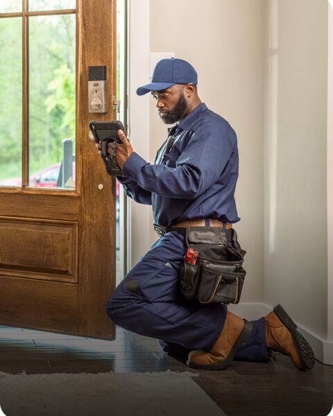 Man installing alarm