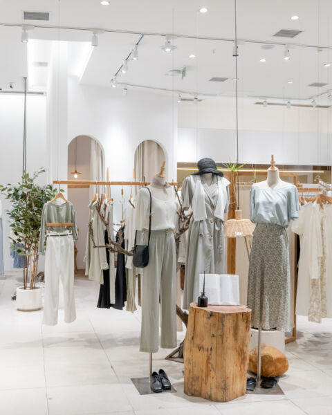 clothing on racks in a store