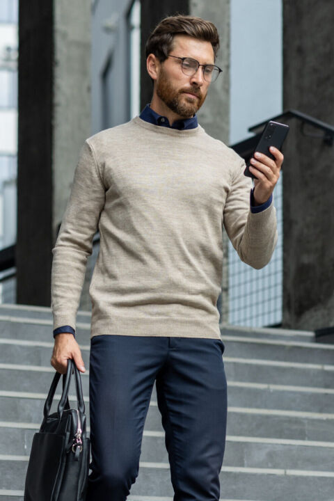 Business owner reviewing an automated activity report while commuting.