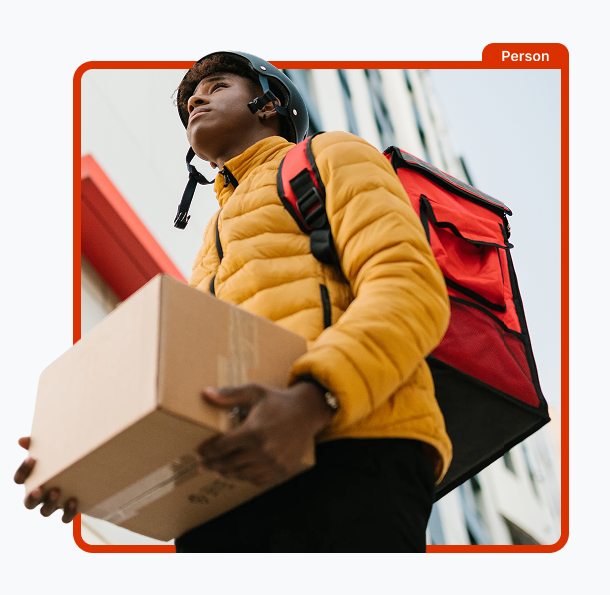 Person carrying a box