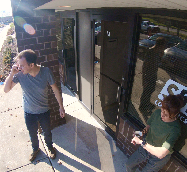 person caught on camera while on the phone