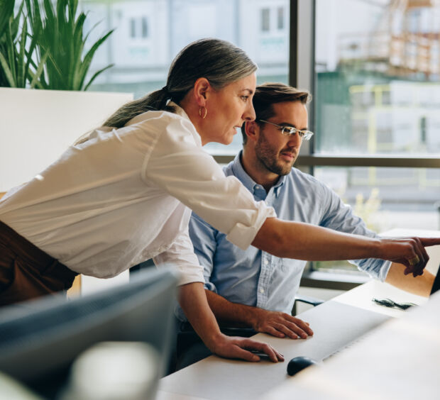Employee working in an open office protected by commercial intrusion detection