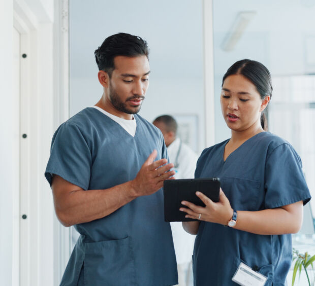 Medical advice, help and doctors with a tablet for healthcare, research and medicine planning. Communication, collaboration and men working in cardiology talking about surgery results on technology.