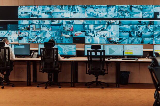 Computer screens on a wall
