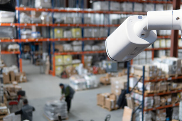video camera watching people work