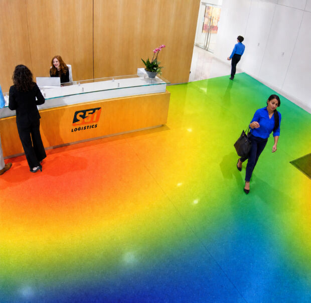 colourful office with people walking around