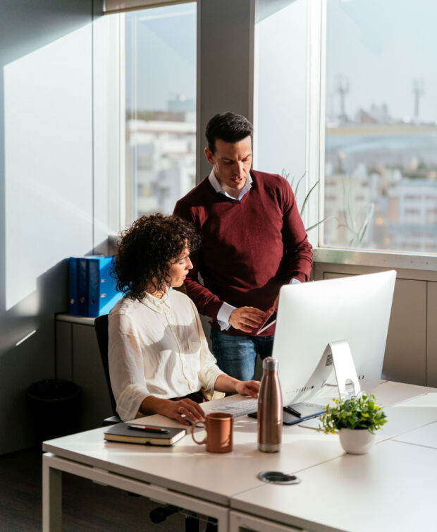 two people using a computer